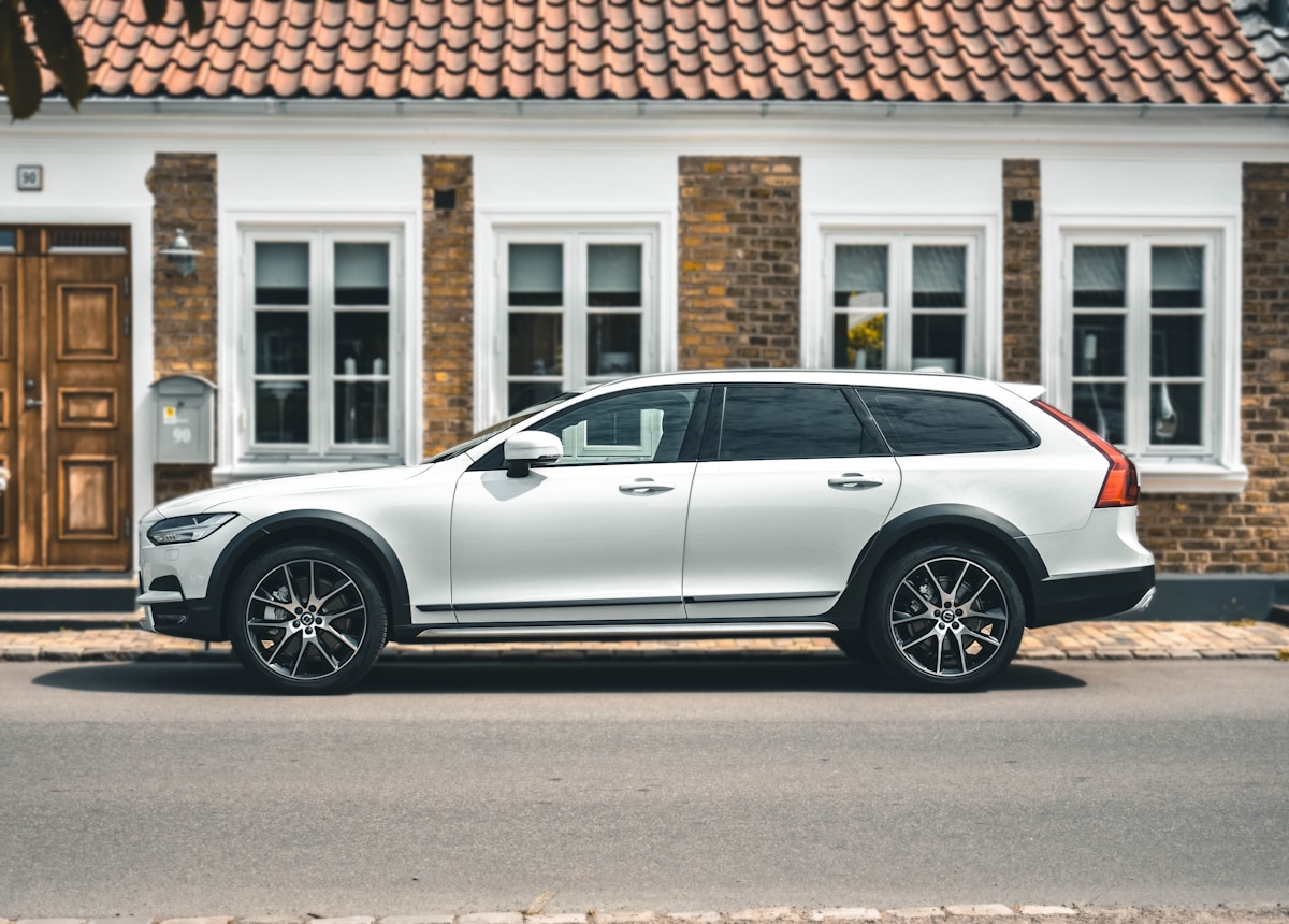 Estate car parked outside a Scandinavian house